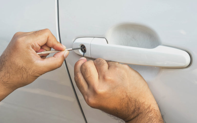 car door unlocking with pick efficient and reliable automotive locksmith services in saint cloud, fl – swift solutions for your automotive lock needs.