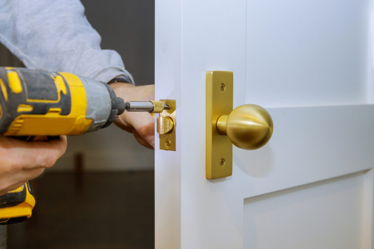 man drilling locks commercial locksmith services in saint cloud, fl – speedy and efficient locksmith services for your office and business